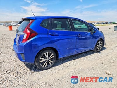 Trzecie zdjęcie samochodu z tyłu: 2017 HONDA FIT EX VIN:3HGGK5H73HM712617 - miniatura