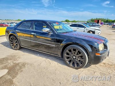 Czwarte zdjęcie samochodu z boku: 2010 CHRYSLER 300 TOURING VIN:2C3CA5CV1AH254011 - miniatura
