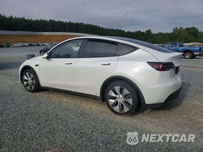Trzecie zdjęcie samochodu z tyłu: 2022 TESLA MODEL Y VIN:7SAYGDEE3NF421975 - miniatura