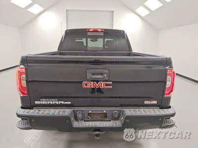Zdjęcie 6 z 12 samochodu: 2017 GMC SIERRA K1500 SLT VIN:3GTU2NEJ7HG166906 - miniatura