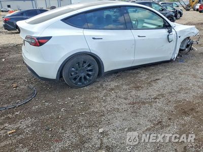 Trzecie zdjęcie samochodu z tyłu: 2021 TESLA MODEL Y VIN:5YJYGDEE7MF240566 - miniatura