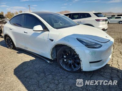 Czwarte zdjęcie samochodu z boku: 2023 TESLA MODEL Y VIN:7SAYGDEE8PA023578 - miniatura