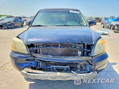 Piąte zdjęcie samochodu w środku: 2004 HONDA PILOT EX VIN:5FNYF18424B009689 - miniatura