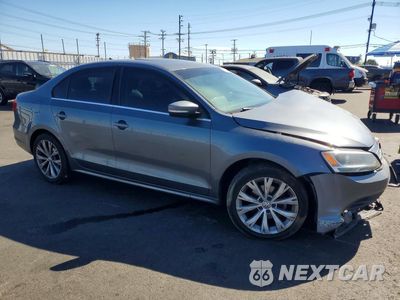 Czwarte zdjęcie samochodu z boku: 2015 VOLKSWAGEN JETTA SE VIN:3VWD17AJ2FM323077 - miniatura