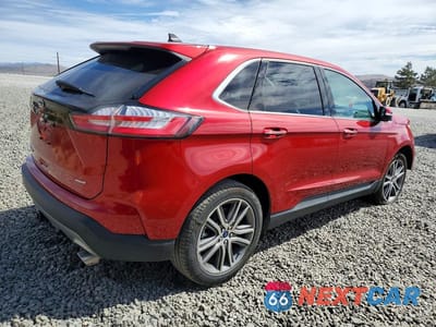Trzecie zdjęcie samochodu z tyłu: 2022 FORD EDGE TITANIUM VIN:2FMPK4K92NBA21140 - miniatura