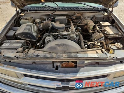 Zdjęcie 12 z 13 samochodu: 1999 CHEVROLET TAHOE C1500 VIN:1GNEC13R4XJ435872 - miniatura