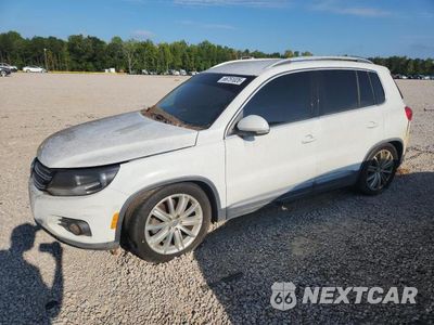 2014 VOLKSWAGEN TIGUAN S WVGAV3AX4EW624029 - główne zdjęcie licytacji z USA - miniatura