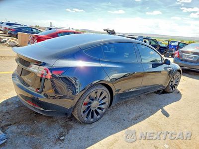 Trzecie zdjęcie samochodu z tyłu: 2022 TESLA MDL 3 VIN:5YJ3E1EC8NF135789 - miniatura
