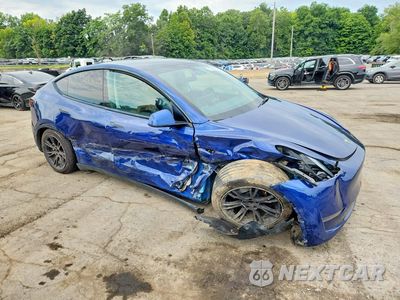 Czwarte zdjęcie samochodu z boku: 2021 TESLA MODEL Y VIN:5YJYGDEE4MF297078 - miniatura