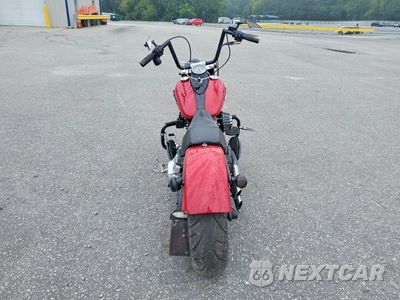 Czwarte zdjęcie samochodu z boku: 2014 HARLEY-DAVIDSON FLS SOFTAIL SLIM VIN:1HD1JRV13EB045306 - miniatura