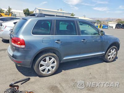Trzecie zdjęcie samochodu z tyłu: 2004 VOLKSWAGEN TOUAREG 4.2 VIN:WVGCM77LX4D077284 - miniatura