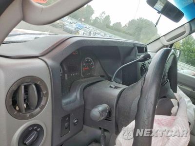 Zdjęcie 17 z 24 samochodu: 2009 FORD ECONOLINE E150 WAGON VIN:1FMNE11W29DA74943 - miniatura