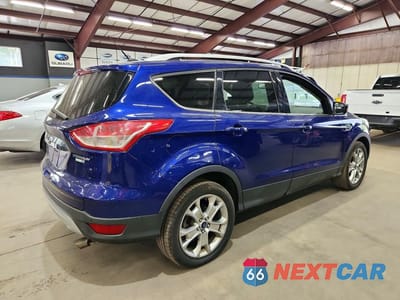Trzecie zdjęcie samochodu z tyłu: 2014 FORD ESCAPE TITANIUM VIN:1FMCU9JX6EUD15270 - miniatura