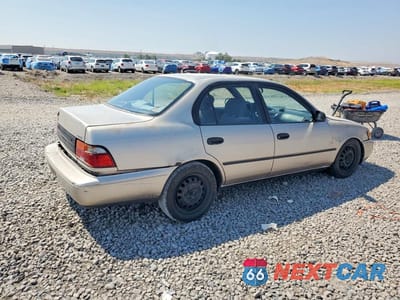 Trzecie zdjęcie samochodu z tyłu: 1994 TOYOTA COROLLA DX VIN:1NXAE09B6RZ204099 - miniatura