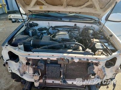 Zdjęcie 11 z 13 samochodu: 2002 TOYOTA TUNDRA LMT VIN:5TBRT38172S311107 - miniatura