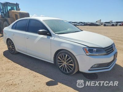 Czwarte zdjęcie samochodu z boku: 2016 VOLKSWAGEN JETTA SPORT VIN:3VWD17AJ1GM256781 - miniatura