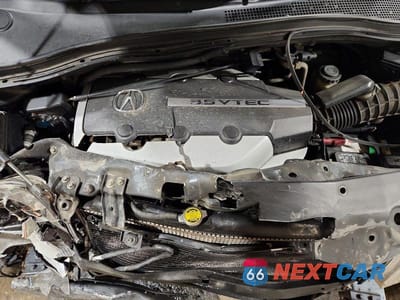 Zdjęcie 12 z 13 samochodu: 2006 ACURA MDX TOURING VIN:2HNYD186X6H533428 - miniatura