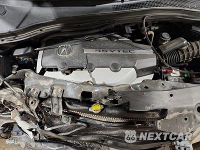 Zdjęcie 12 z 13 samochodu: 2006 ACURA MDX TOURING VIN:2HNYD186X6H533428 - miniatura