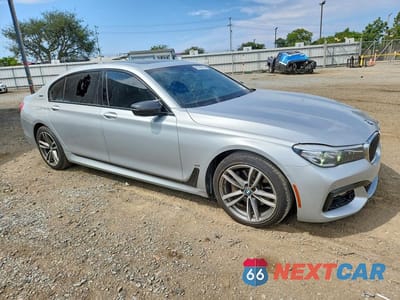 Czwarte zdjęcie samochodu z boku: 2017 BMW 740 XE VIN:WBA7J2C38HG497859 - miniatura