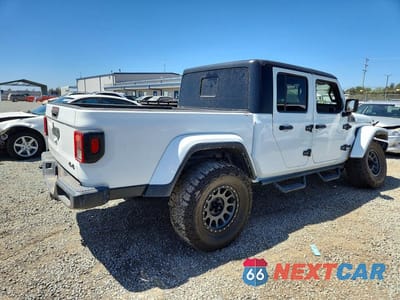 Trzecie zdjęcie samochodu z tyłu: 2021 JEEP GLADIATOR SPORT VIN:1C6HJTAG3ML577937 - miniatura