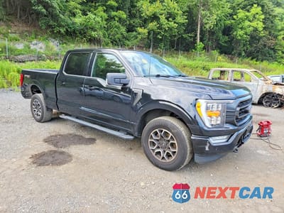 Czwarte zdjęcie samochodu z boku: 2021 FORD F150 SUPERCREW VIN:1FTFW1E81MFB90620 - miniatura