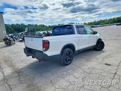 Trzecie zdjęcie samochodu z tyłu: 2025 HONDA RIDGELINE BLACK EDITION VIN:5FPYK3F86SB033141 - miniatura