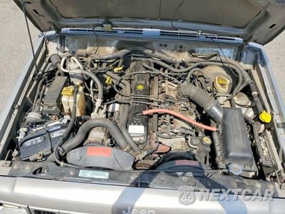 Zdjęcie 12 z 13 samochodu: 2001 JEEP CHEROKEE SPORT VIN:1J4FF48S61L512264 - miniatura