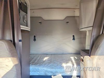 Zdjęcie 10 z 14 samochodu: 2016 VOLVO VNL SEMI TRUCK VIN:4V4NC9EG8GN942595 - miniatura