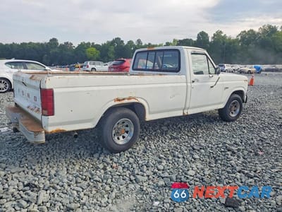 Trzecie zdjęcie samochodu z tyłu: 1984 FORD F150 VIN:1FTCF15Y4ENA83569 - miniatura