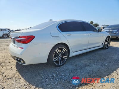 Trzecie zdjęcie samochodu z tyłu: 2017 BMW 750 I VIN:WBA7F0C50HGM20944 - miniatura
