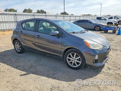 Czwarte zdjęcie samochodu z boku: 2013 TOYOTA PRIUS C FOUR VIN:JTDKDTB31D1041792 - miniatura