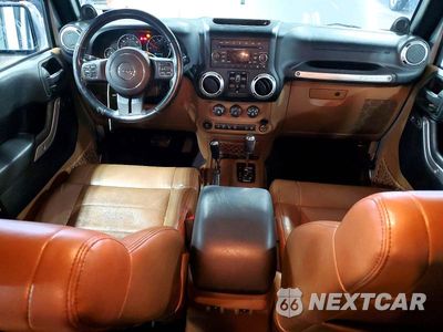 Zdjęcie 8 z 14 samochodu: 2012 JEEP WRANGLER UNLIMITED SAHARA VIN:1C4BJWEG6CL170624 - miniatura