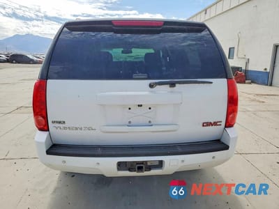 Zdjęcie 6 z 12 samochodu: 2010 GMC YUKON XL K1500 SLT VIN:1GKUKKE3XAR257906 - miniatura