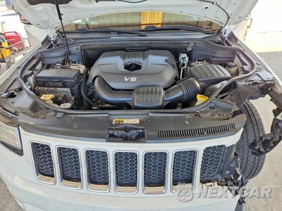 Zdjęcie 11 z 12 samochodu: 2014 JEEP GRAND CHEROKEE OVERLAND VIN:1C4RJECG4EC418013 - miniatura