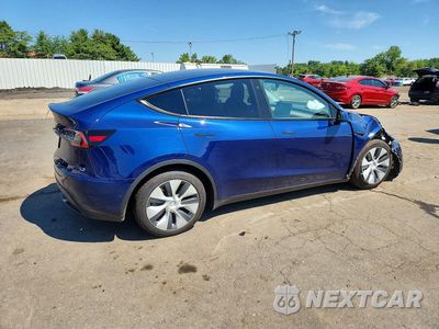 Trzecie zdjęcie samochodu z tyłu: 2022 TESLA MODEL Y VIN:7SAYGDEE0NF401814 - miniatura