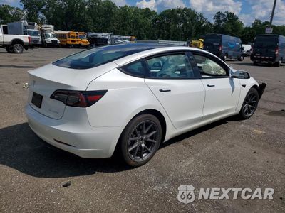 Trzecie zdjęcie samochodu z tyłu: 2023 TESLA MODEL 3 VIN:5YJ3E1EB3PF603051 - miniatura