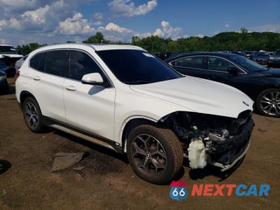 Czwarte zdjęcie samochodu z boku: 2018 BMW X1 XDRIVE28I VIN:WBXHT3C37J5L30999 - miniatura