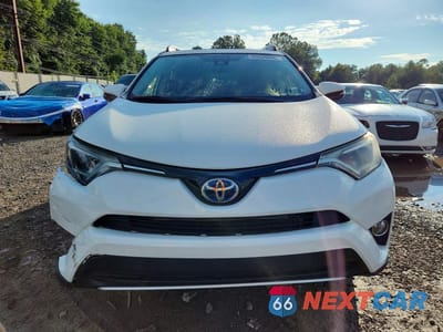 Piąte zdjęcie samochodu w środku: 2018 TOYOTA RAV4 HYBRID XLE VIN:JTMRJREV5JD253550 - miniatura
