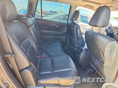 Zdjęcie 11 z 13 samochodu: 2017 HONDA PILOT EXL VIN:5FNYF5H89HB043970 - miniatura