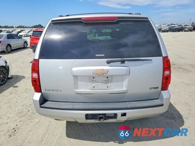 Zdjęcie 6 z 13 samochodu: 2011 CHEVROLET TAHOE K1500 LS VIN:1GNSKAE08BR378266 - miniatura