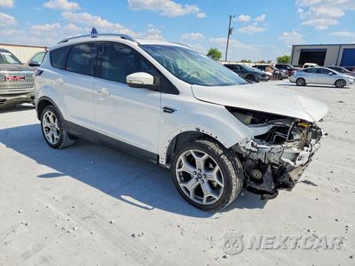 Czwarte zdjęcie samochodu z boku: 2017 FORD ESCAPE TITANIUM VIN:1FMCU0J95HUE15670 - miniatura