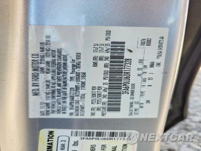 Zdjęcie 12 z 12 samochodu: 2013 FORD FUSION SE HYBRID VIN:3FA6P0LU6DR177328 - miniatura