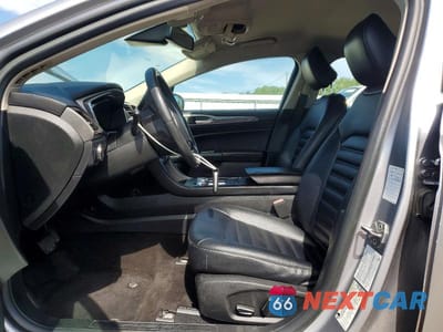 Zdjęcie 7 z 13 samochodu: 2020 FORD FUSION SEL VIN:3FA6P0CD0LR196617 - miniatura