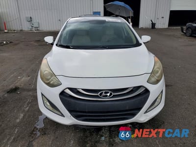 Piąte zdjęcie samochodu w środku: 2013 HYUNDAI ELANTRA GT BASE VIN:KMHD35LE5DU088535 - miniatura
