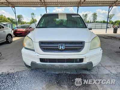 Piąte zdjęcie samochodu w środku: 2004 HONDA PILOT EX VIN:2HKYF18454H541844 - miniatura