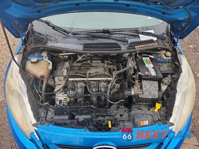 Zdjęcie 11 z 12 samochodu: 2012 FORD FIESTA SES VIN:3FADP4FJ8CM117997 - miniatura