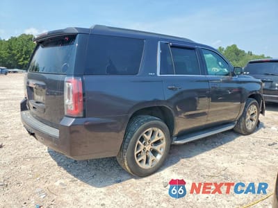Trzecie zdjęcie samochodu z tyłu: 2016 GMC YUKON SLT VIN:1GKS2BKC1GR388081 - miniatura
