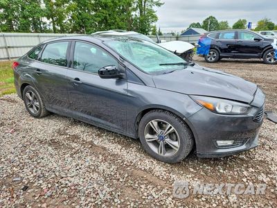 Czwarte zdjęcie samochodu z boku: 2018 FORD FOCUS SE VIN:1FADP3FEXJL298354 - miniatura