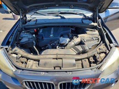 Zdjęcie 12 z 13 samochodu: 2014 BMW X1 SDRIVE28I VIN:WBAVM1C5XEVW50517 - miniatura