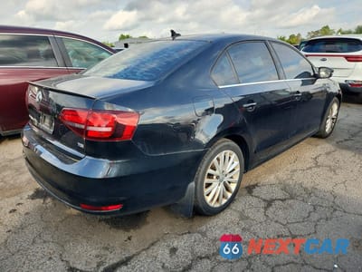 Trzecie zdjęcie samochodu z tyłu: 2016 VOLKSWAGEN JETTA SEL VIN:3VWL17AJ0GM244682 - miniatura